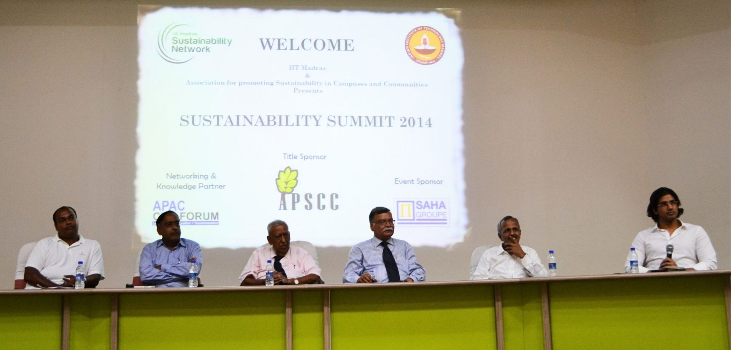 Panel at the Sustainability Summit 2014, IIT Madras, with APSCC listed as Title Sponsor on the welcome slide